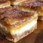 Churro Cheesecake Bars Easy Cinnamon-Sugar Dessert Recipe