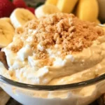 Delicious cheesecake dip served with fresh fruit and crackers