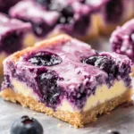 Delicious classic blueberry cheesecake bars with creamy filling and blueberry topping