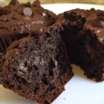 Delicious, healthy chocolate muffins topped with chocolate chips.