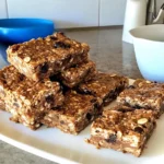 Homemade energy bars made with oats, nuts, and dried fruits
