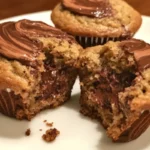 Delicious Nutella Muffins with a chocolatey filling and a golden top