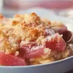 Delicious homemade rhubarb crumble served in a bowl with a crispy topping