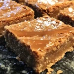 Delicious salted caramel blondies with a golden-brown color and rich caramel drizzle