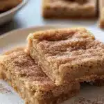 Delicious homemade Snickerdoodle Bars topped with cinnamon sugar