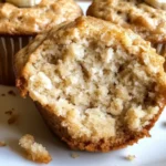 Freshly baked Vegan Banana Muffins on a wooden table