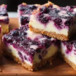 Delicious blueberry cream cheese bars topped with fresh blueberries