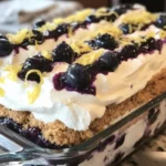 Blueberry lemon icebox cake decorated with fresh blueberries and lemon slices