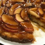 Delicious Caramel Apple Upside Down Cake topped with gooey caramel and fresh apples.