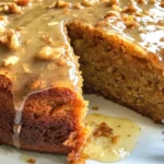 Delicious gluten-free Carrot and Cardamom Cake on a rustic wooden table