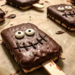 Delicious chocolate covered graham crackers on a wooden platter