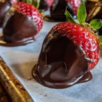 Delicious chocolate covered strawberries on a decorative plate