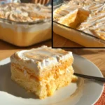 Creamy orange cake topped with zest and cream, perfect for celebrations.