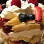 Delicious lemon berry trifle with layers of lemon cream and fresh berries