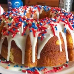 Delicious Patriotic Bundt Cake decorated red, white, and blue for celebrations.