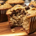 Homemade Peanut Butter Banana Muffins on a wooden table