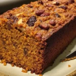 Delicious slice of pumpkin date cake with autumn spices and dates
