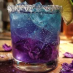 Purple Cabbage Margaritas served in a glass with garnishes