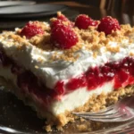 Delicious Raspberry Cheesecake Lasagna with layers of raspberries and creamy cheesecake