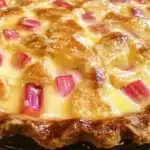 Deliciously baked rhubarb custard pie with a flaky crust