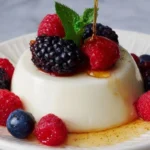 Delicious Vanilla Yogurt Panna Cotta topped with fresh berries