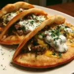 Cheesy beef and mushroom pita pockets with tzatziki delight!